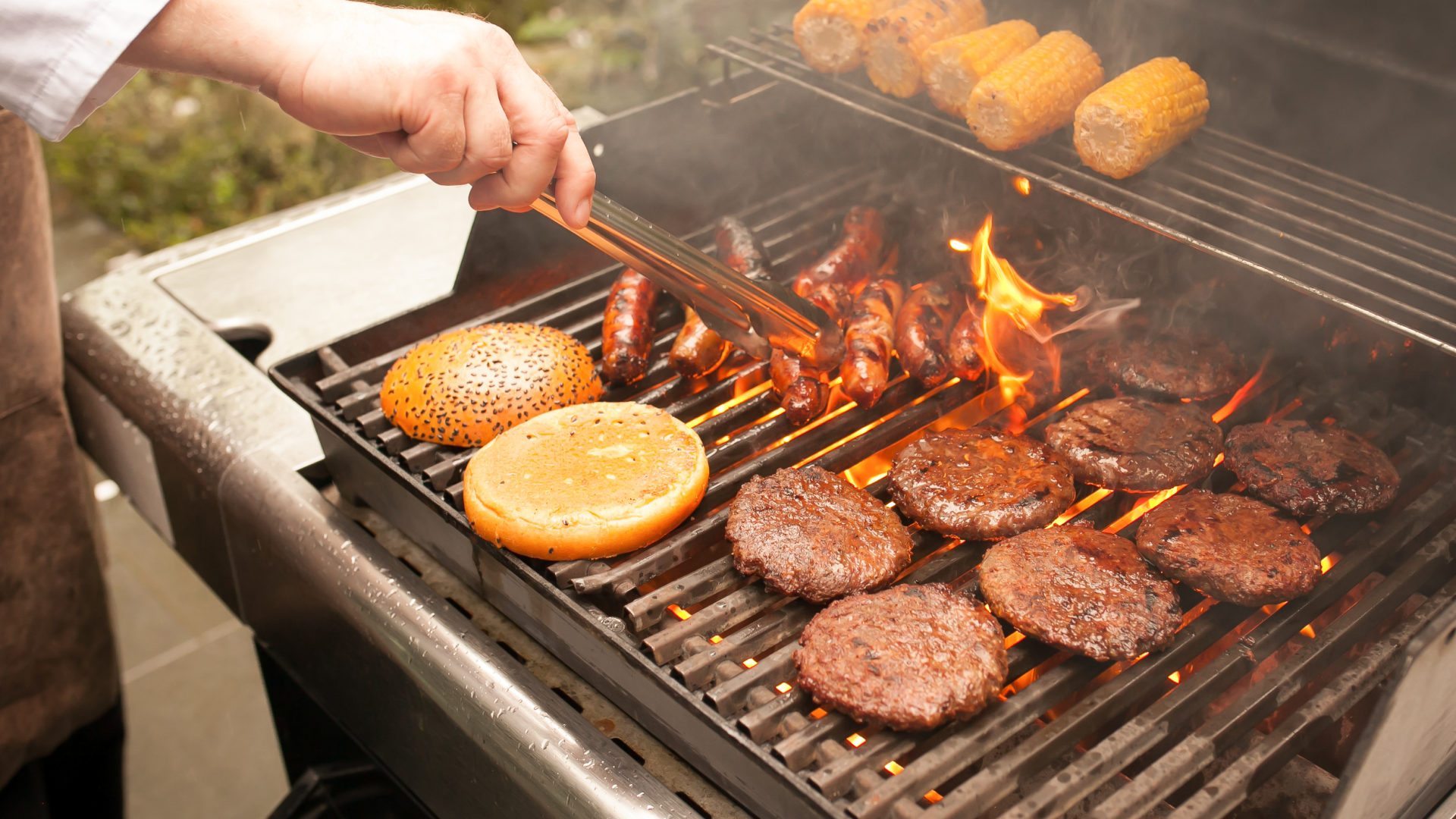 chef grilling burgers for a corporate BBQ in the gibson hotel | bbq venue Dublin