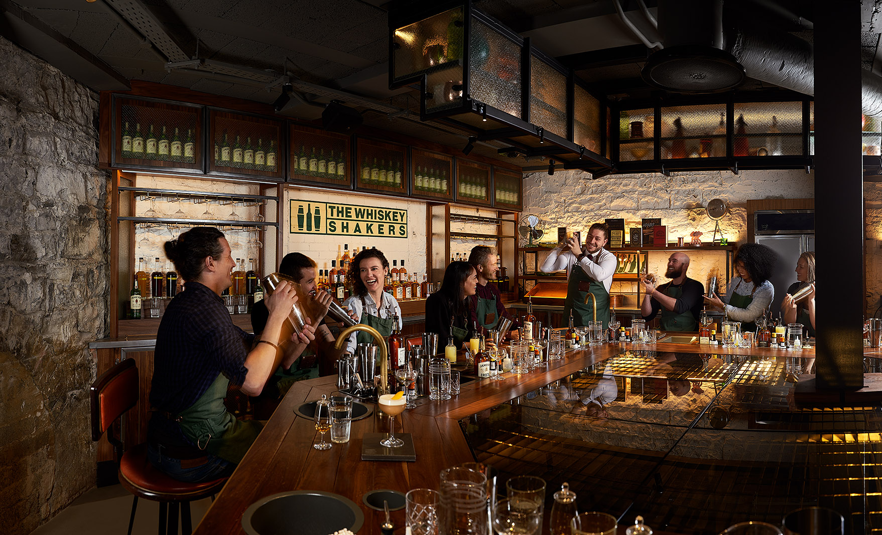 People chatting at the bar | Jameson Distillery Bar | Hotel Breaks Dublin