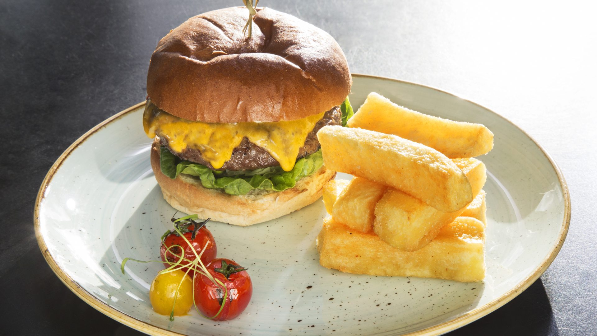 burger and chips on a plate | hotel room service | the gibson